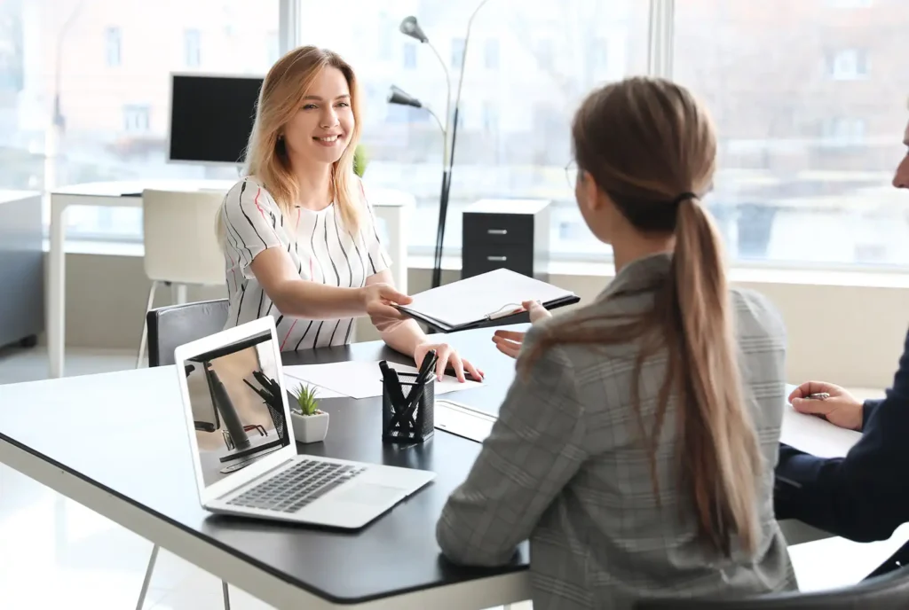 Human resources interviewing woman