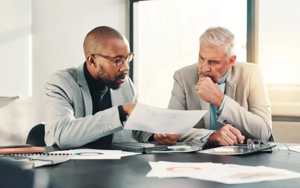 Finance, meeting or business people with paperwork for planning for teamwork, contract or budget