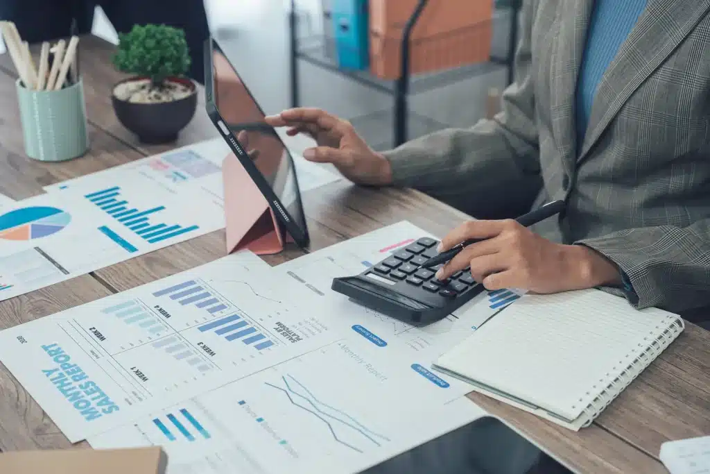 Auditor and accountant team working in office, analyze financial data