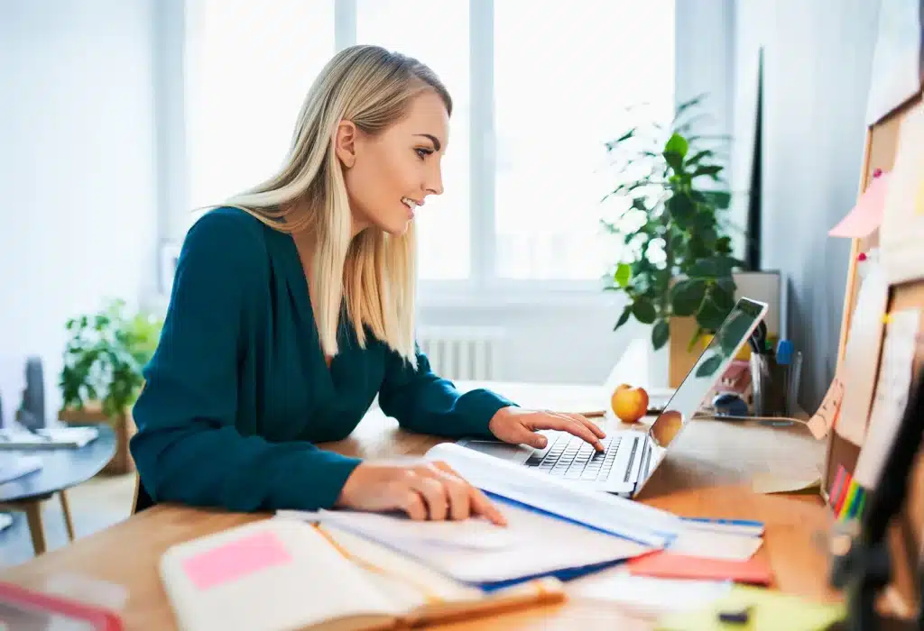 woman working doing accounting job from home office